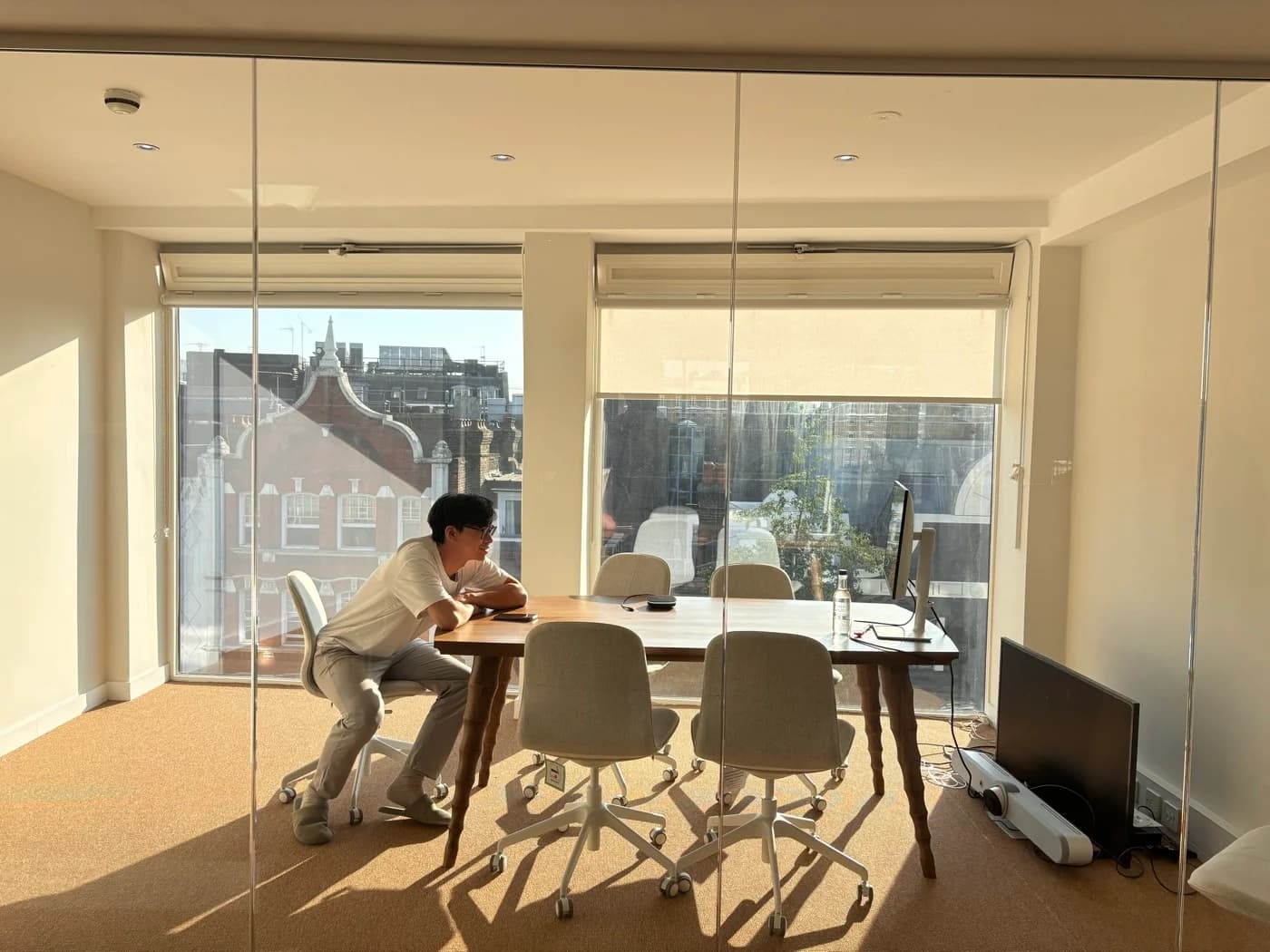 Anima colleague working in the shared dining area